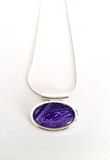 Purple small abstract tube pendant hand painted in bees wax and sealed in glass beautifully