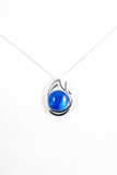 Blue double teardrop pendant handpainted in wax and sealed in glass stylish and beautiful
