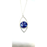 Blue abstract fish eye pendant stunning handpainted in wax and sealed in glass 