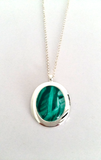 Jade oval pendant elegant and simple yet stylish hand painted on bees wax and sealed in glass to make the beautiful cabochon 