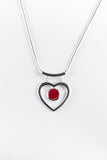 Stunning heart pendant, handpainted in bees wax and sealed in glass, silver plated, 10mm cabochon 