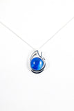 Blue double teardrop pendant handpainted in wax and sealed in glass stylish and beautiful 