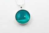Sterling silver jade moon scape pendant strikingly stunning hand painted in bees wax  and sealed in glass 
